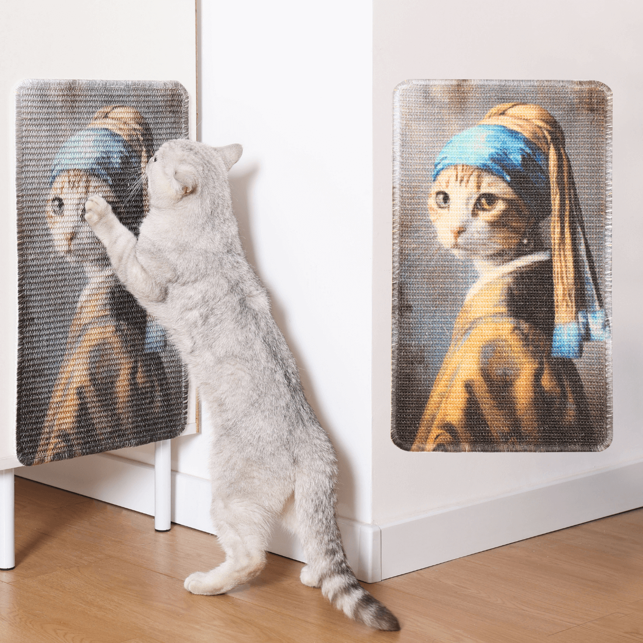 Cat scratching at art-inspired sisal mat featuring a feline rendition of the Girl with a Pearl Earring.