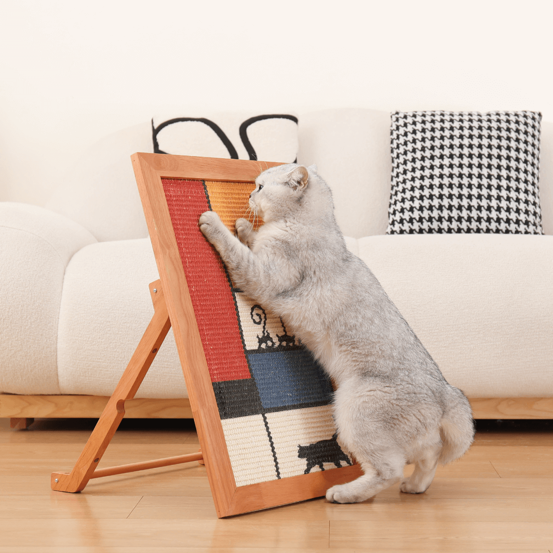 Cat enjoying The Ultimate SiSal Art Scratcher, a stylish sisal frame scratcher for endless fun and relaxation.